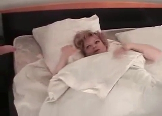 Young son is playing with a fat mom's pussy